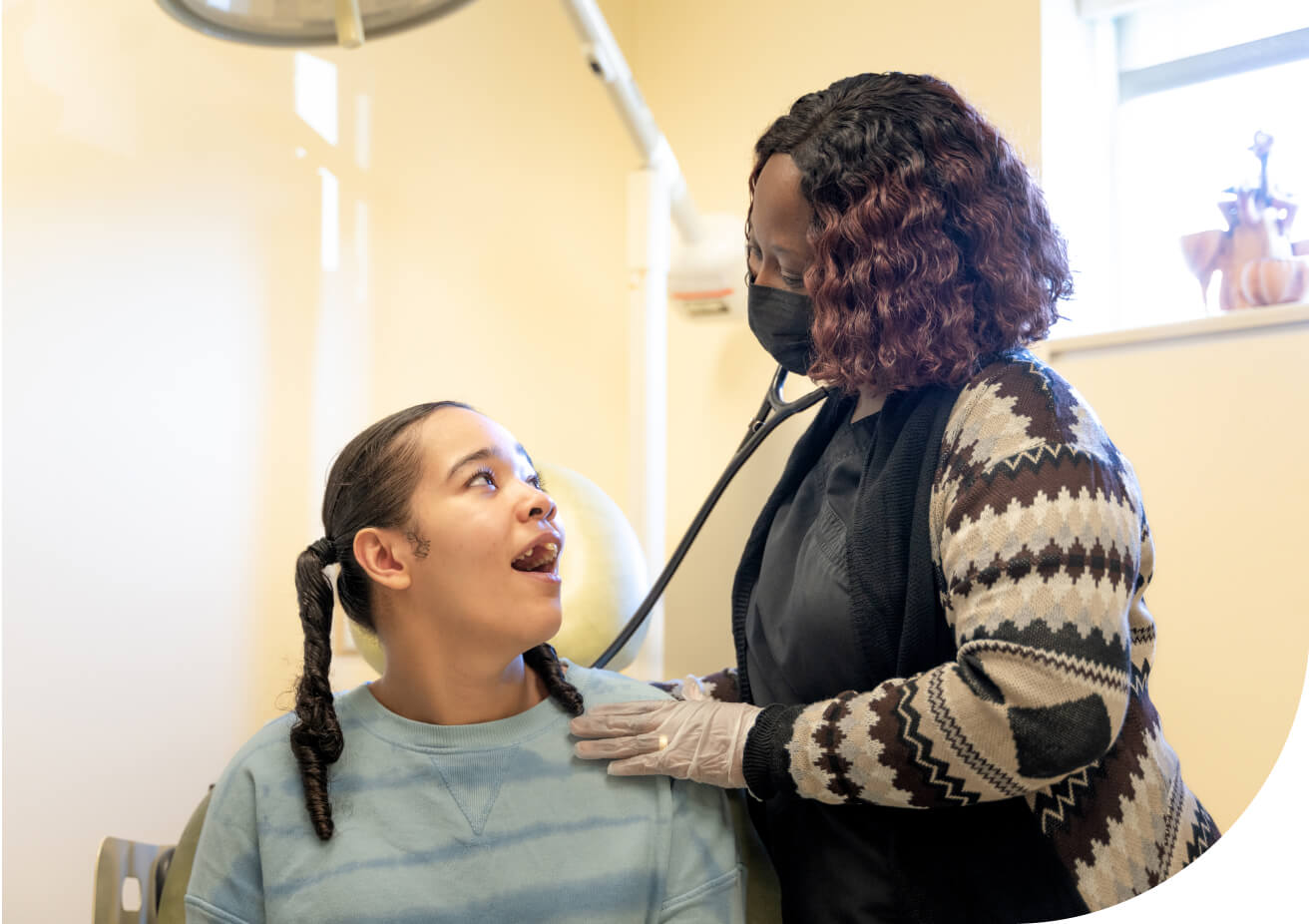 A nurse practitioner with a patient.