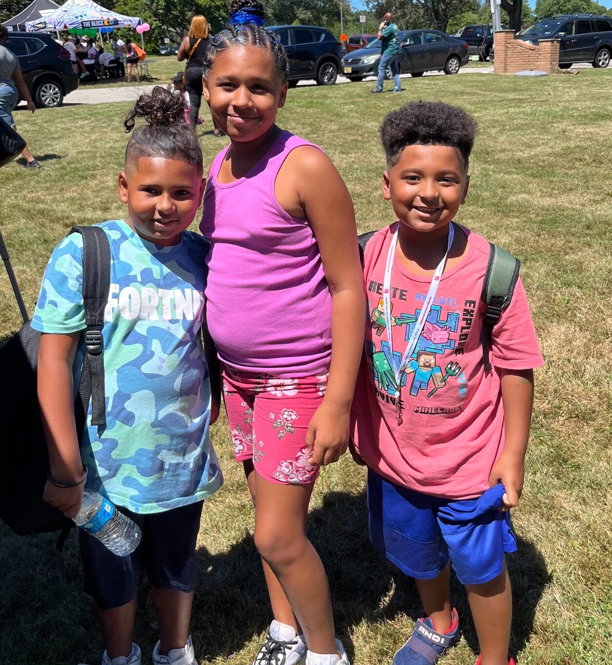 Three children at a festival