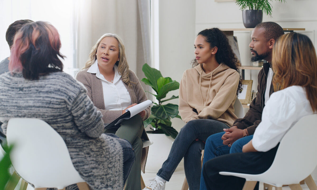 A group of people are discussing