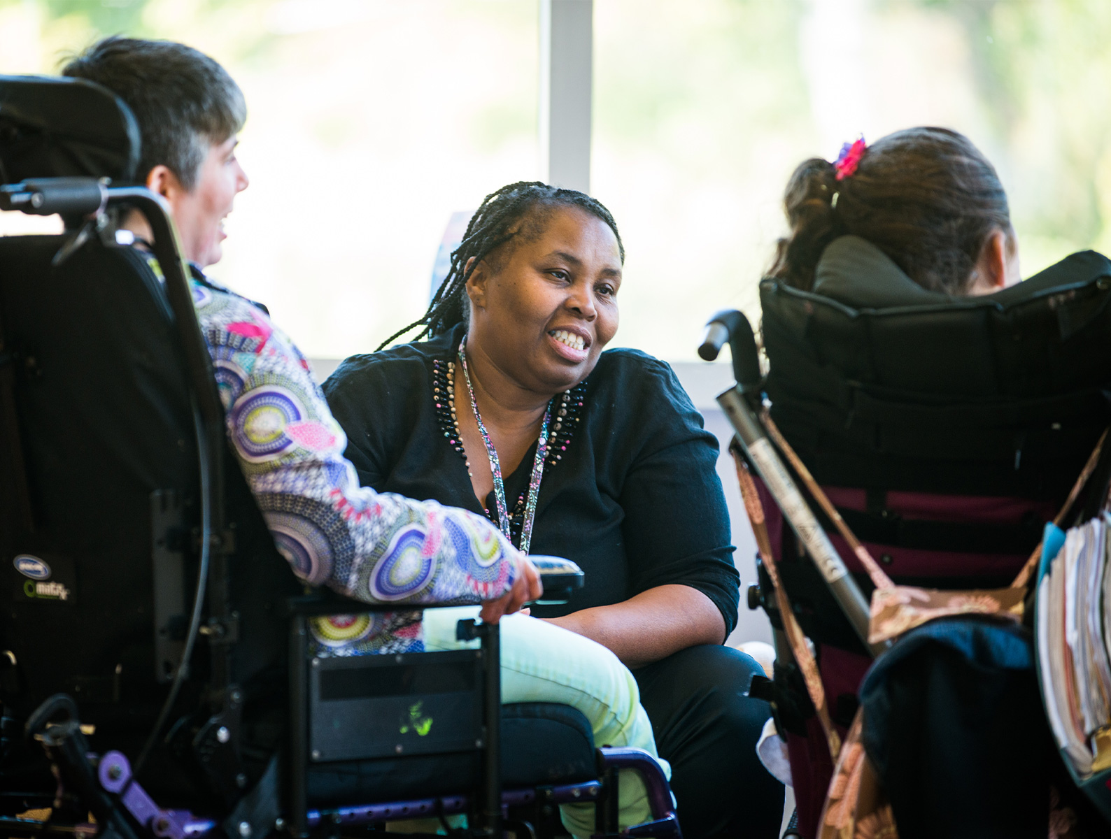 woman sitting in the waiting room of the Medical Center