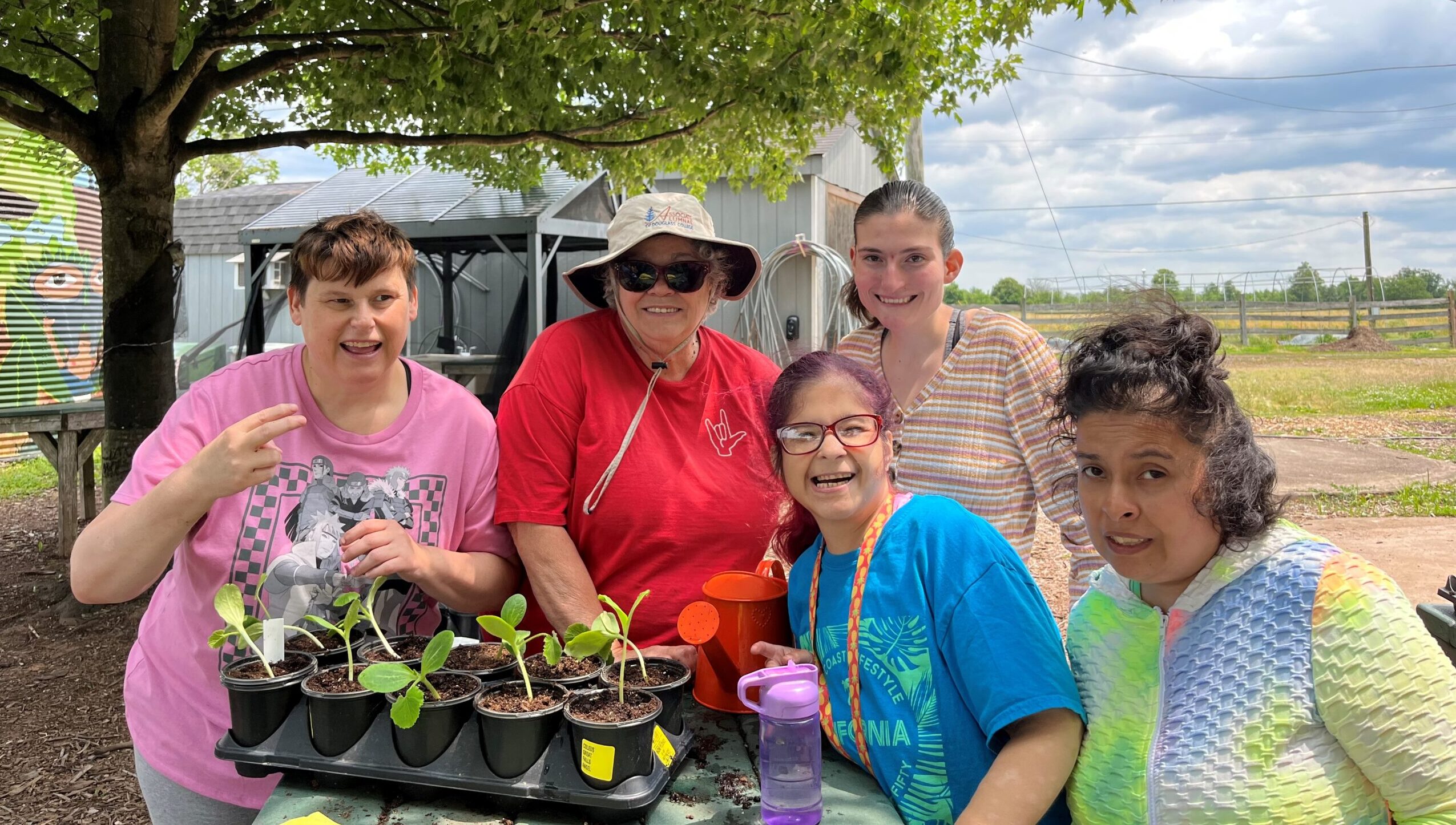 A group of women tending to plants at Flemington Day