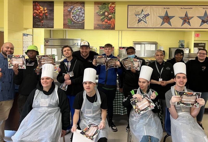 Students taking a culinary class at Woods Schools