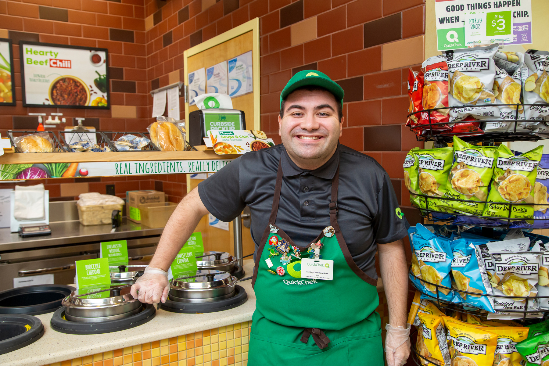 Man working at a Subway restaurant