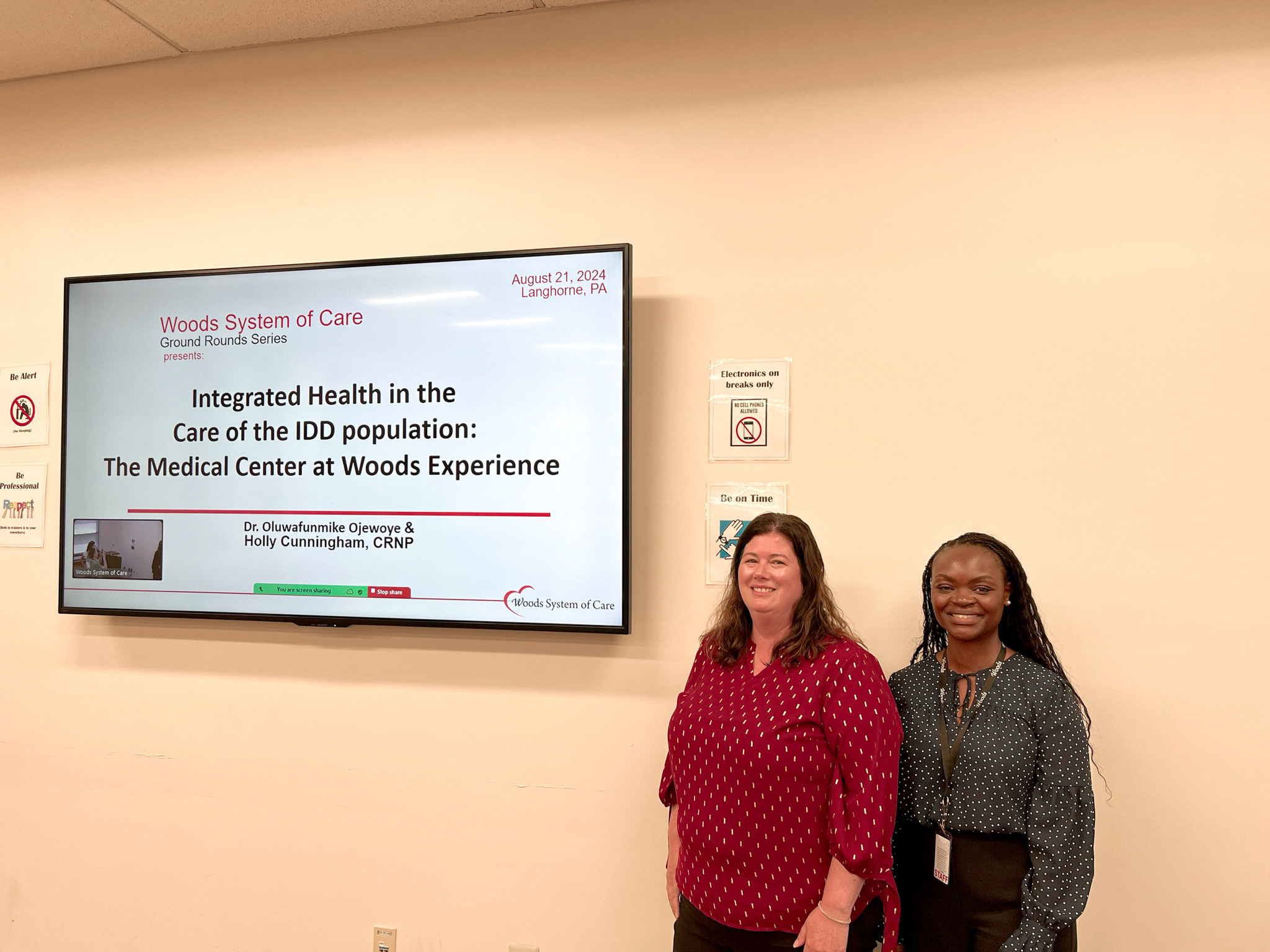 Dr. Ojewoye and Holly Cunningham at Grand Rounds Presentation